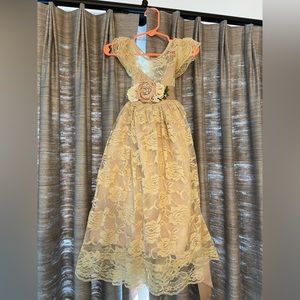 Like new flower girl lace dress with separate floral sash around empire waist.